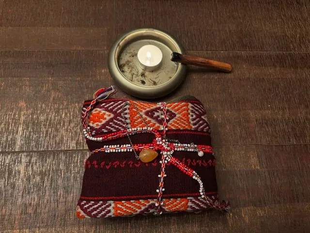 Mesa met een brandende kaars